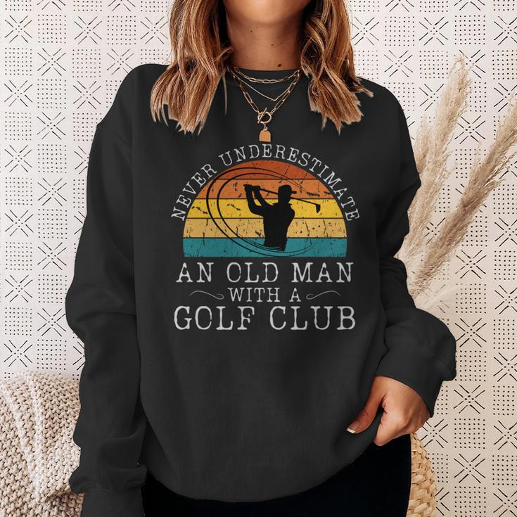 Never Underestimate An Old Man With A Golf Club Retro Sunset Sweatshirt Gifts for Her