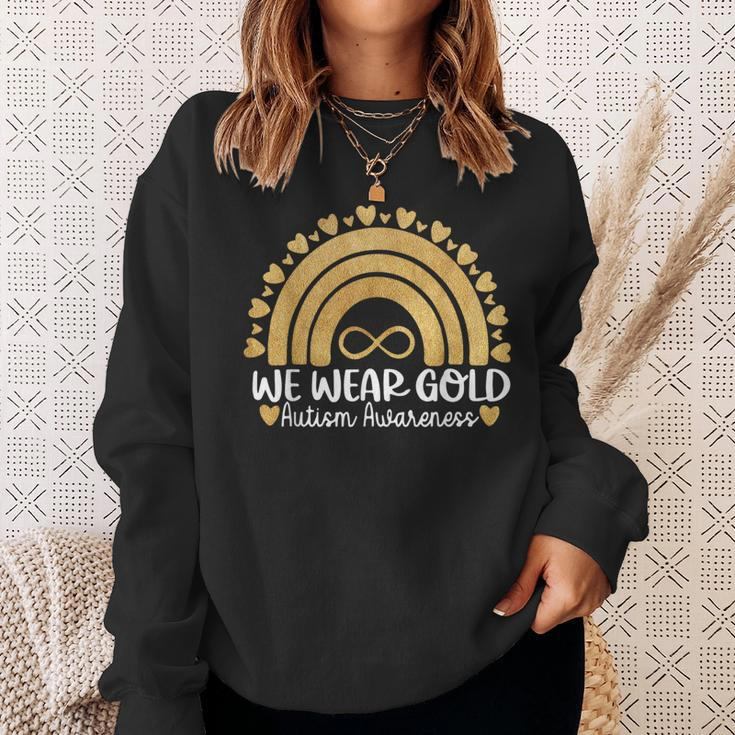 We Wear Gold For Autism Awareness Month Autistic Rainbow Sweatshirt Gifts for Her