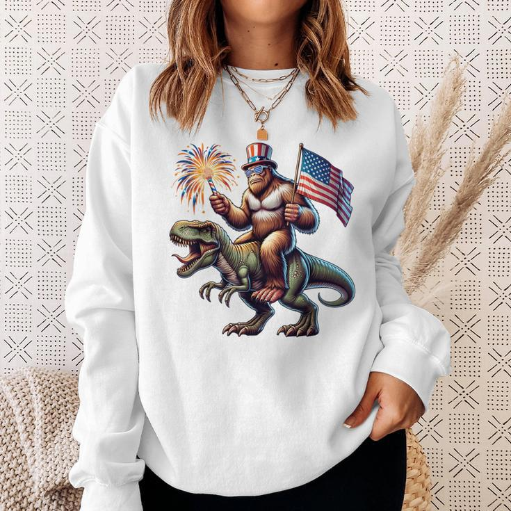 Bigfoot Sasquatch Riding DinosaurRex 4Th Of July Sweatshirt Gifts for Her