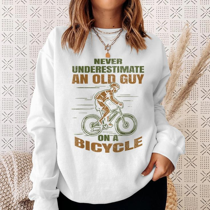 Bike Cycling Never Underestimate An Old Guy On A Bicycle Sweatshirt Gifts for Her