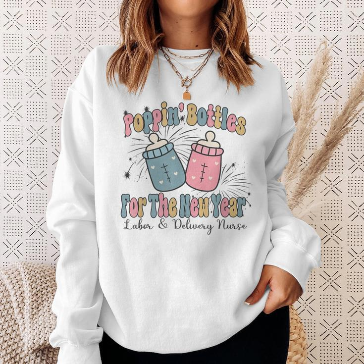 Poppin' Bottles For The New Year 2024 Labor And Delivery Sweatshirt Gifts for Her