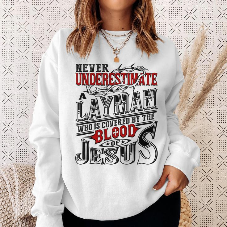 Never Underestimate Layman Family Name Sweatshirt Gifts for Her