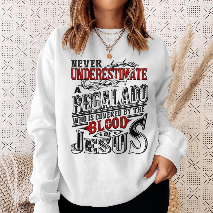Never Underestimate Regalado Family Name Sweatshirt Gifts for Her