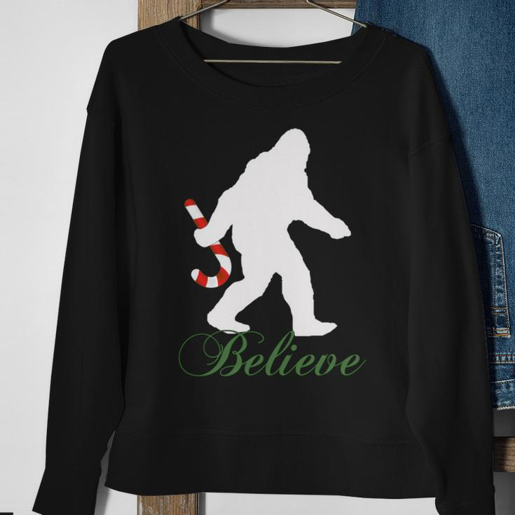 Bigfoot Sasquatch Yeti Believe Candy Cane Christmas Pajamas Sweatshirt Gifts for Old Women