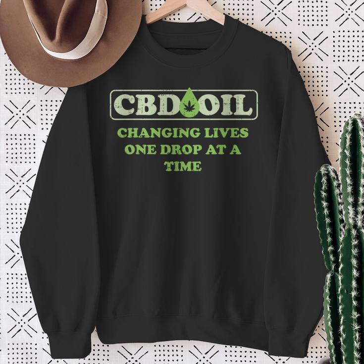 Cbd Oil Changing Lives One Drop At A Time Hemp Slogan Sweatshirt Gifts for Old Women