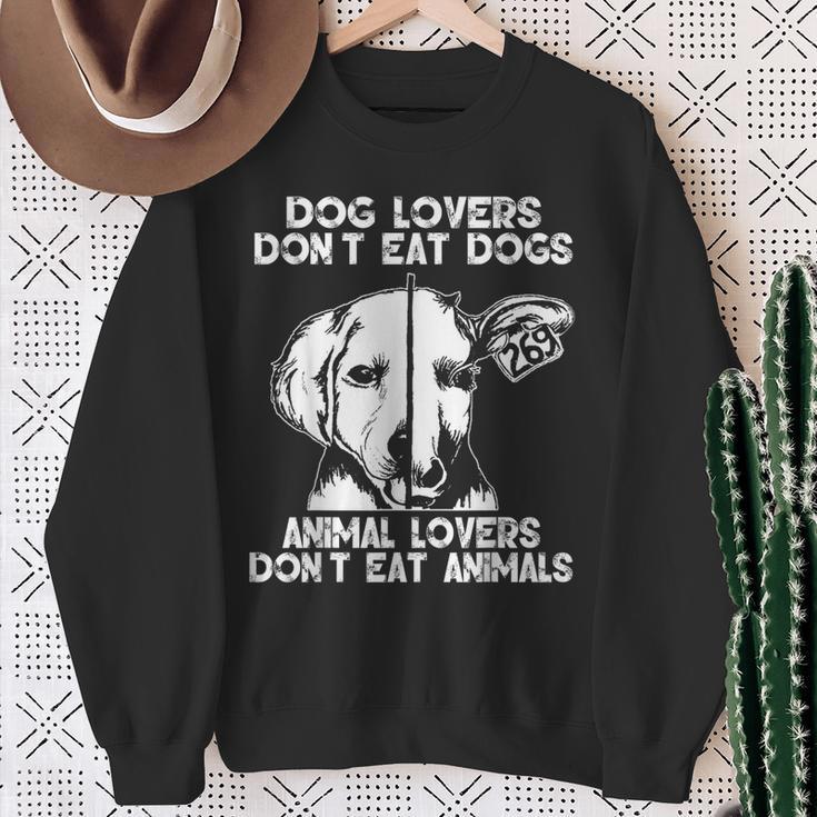 Dog Lovers Don't Eat Dogs Animal Lovers Don't Eat Animals Sweatshirt Gifts for Old Women