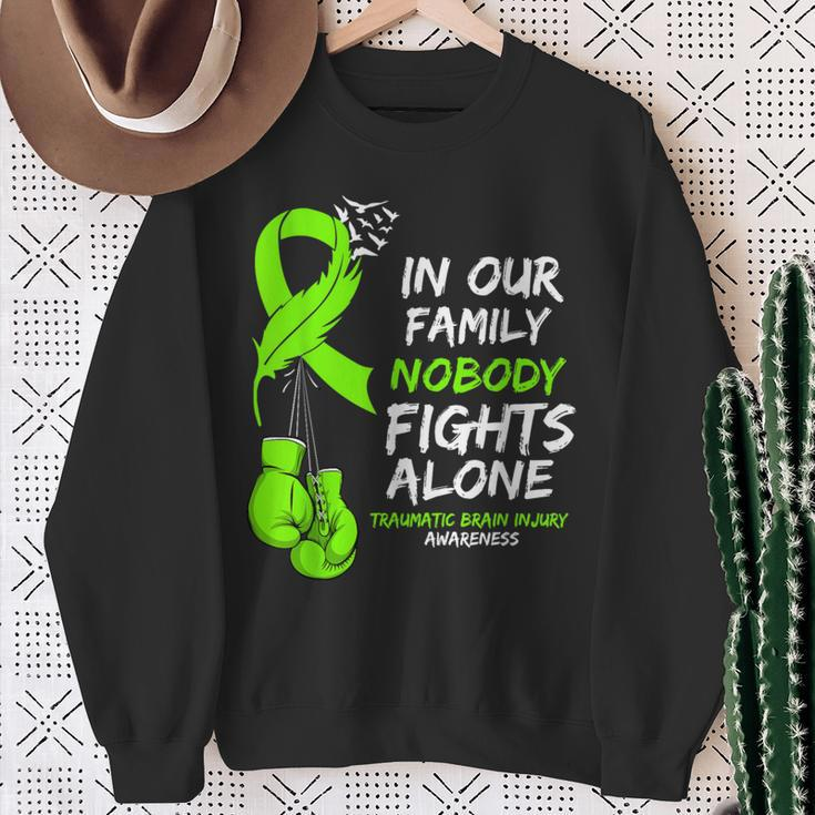 In Our Family Nobody Fights Alone Traumatic Brain Injury Sweatshirt Gifts for Old Women