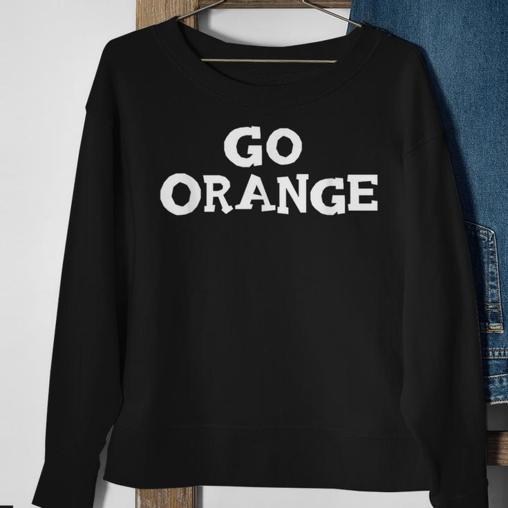 Go Orange Team Spirit Gear Color War Oranges Wins The Game Sweatshirt Gifts for Old Women