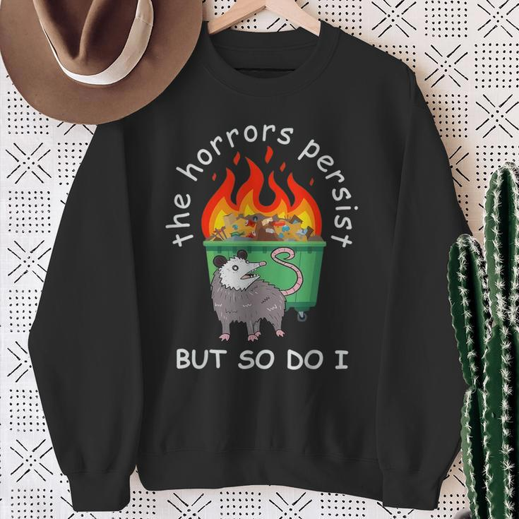 The Horrors Persist But So Do I Dumpster Fire Opossum Sweatshirt Gifts for Old Women