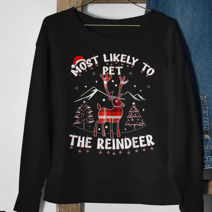 Most Likely To Pet The Reindeer Christmas Party Pajama Sweatshirt Gifts for Old Women