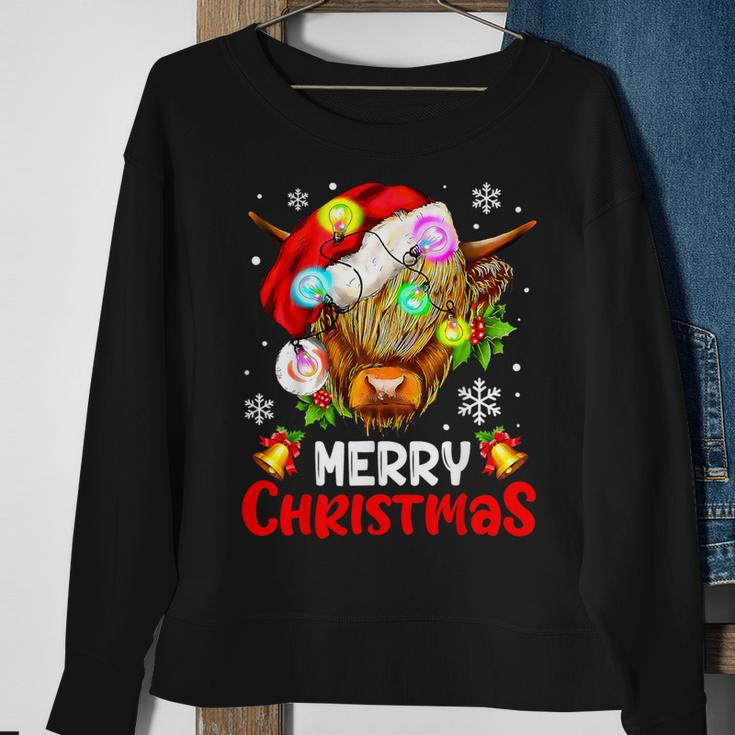 Merry Christmas Highland Cow Western Santa Hat Xmas Pajamas Sweatshirt Gifts for Old Women
