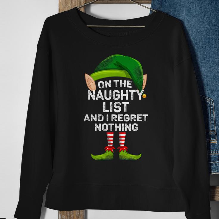 On The Naughty List And I Regret Nothing Elf Christmas Sweatshirt Gifts for Old Women