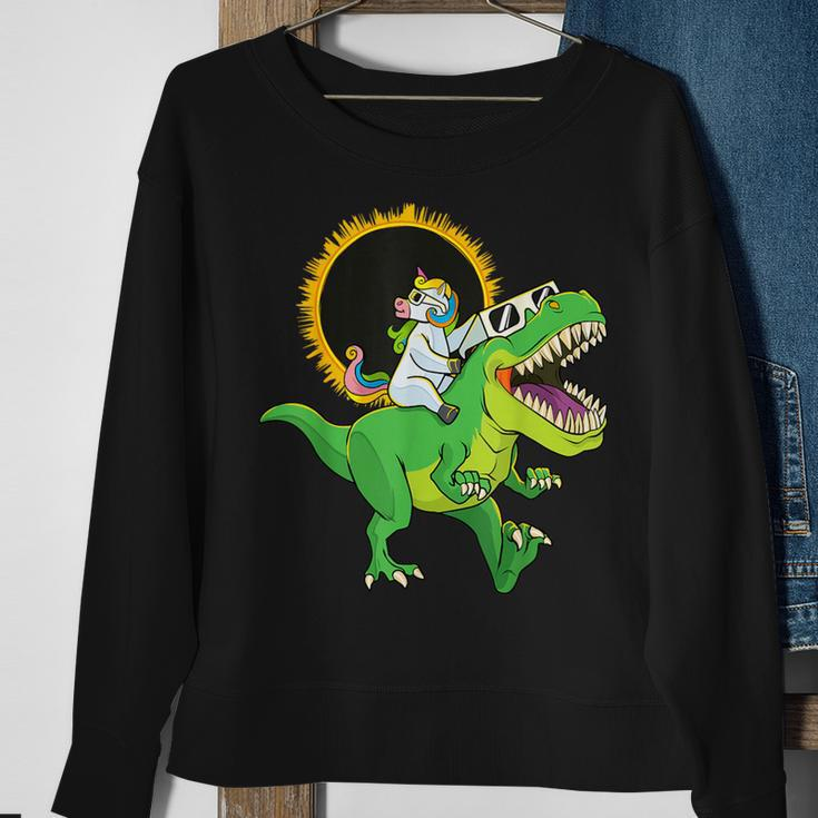 Solar Eclipse 2024 Unicorn Riding T-Rex Dinosaur Boys Sweatshirt Gifts for Old Women