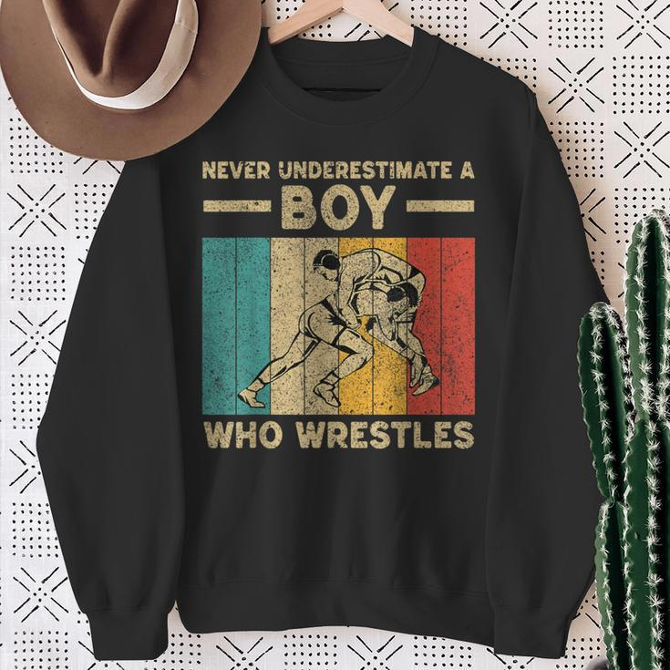 Never Underestimate A Boy Who Wrestles Vintage Wrestling Sweatshirt Gifts for Old Women