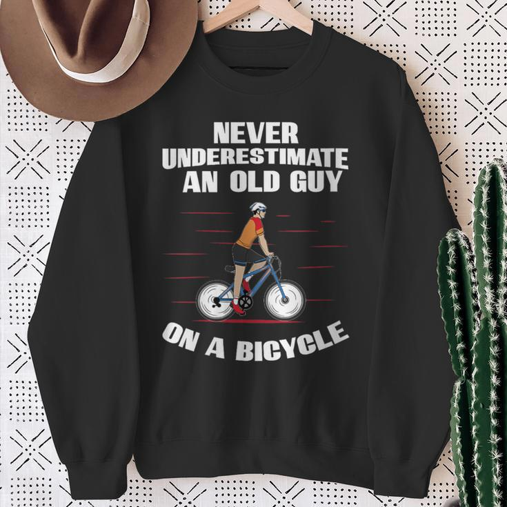 Never Underestimate An Old Guy On A Bicycle Fathers Day Sweatshirt Gifts for Old Women