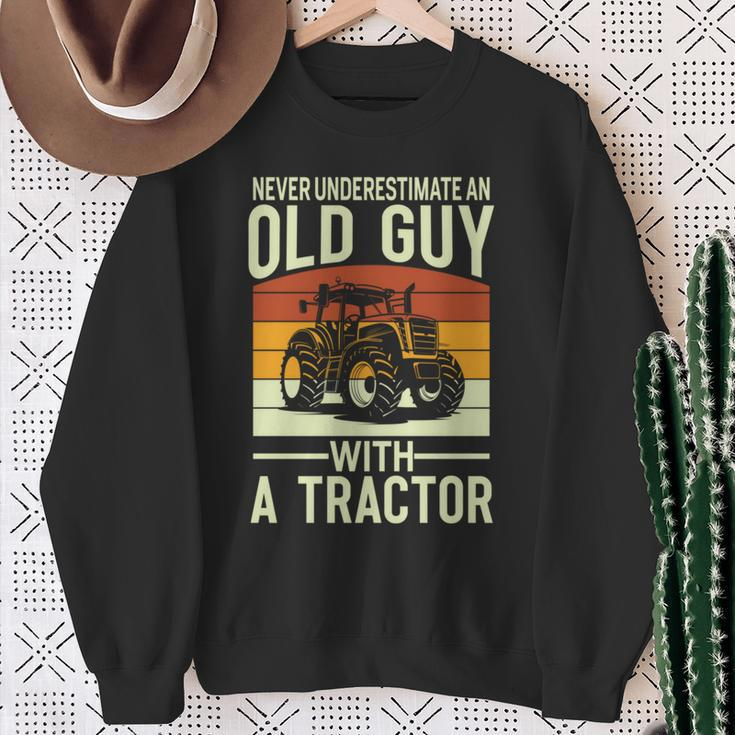 Never Underestimate An Old Guy With A Tractor Farmer Sweatshirt Gifts for Old Women