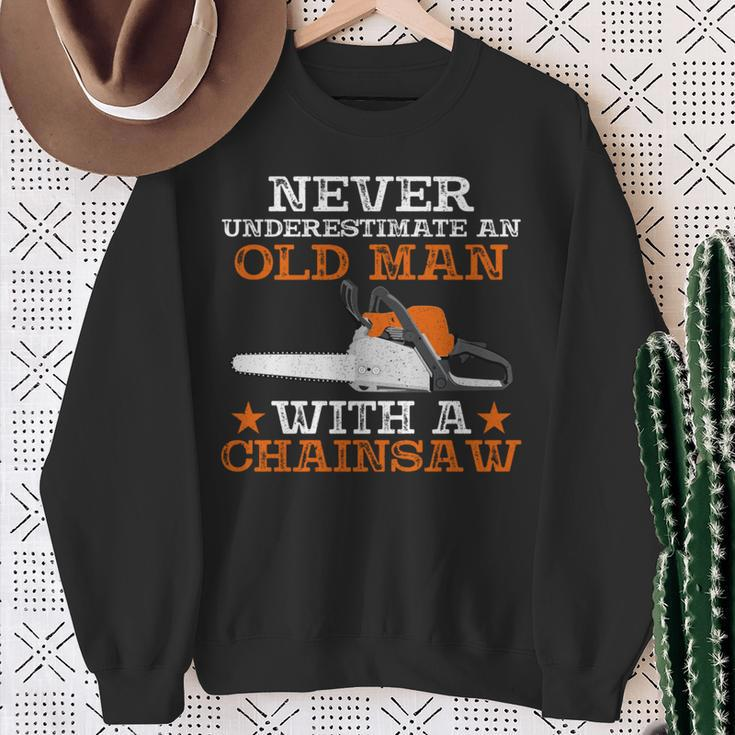 Never Underestimate An Old Man With Chainsaw Lumberjack Wood Sweatshirt Gifts for Old Women