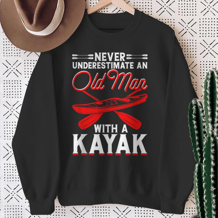Never Underestimate An Old Man With A Kayak Kayaking Sweatshirt Gifts for Old Women