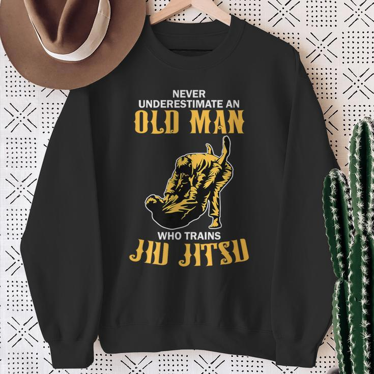 Never Underestimate An Old Man Training Brazilian Jiu Jitsu Sweatshirt Gifts for Old Women