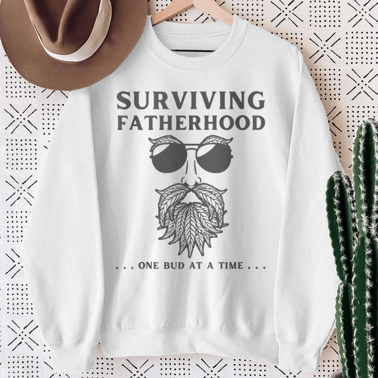 Surviving Fatherhood One Bud At A Time Weed Dad Cannabis Da Sweatshirt Gifts for Old Women