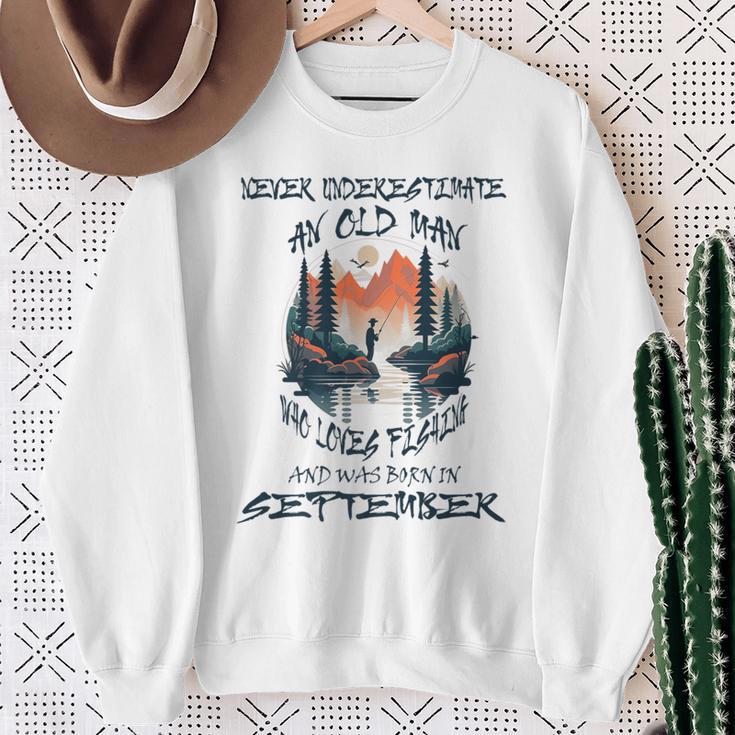 Never Underestimate Old Man Loves Fishing Born In September Sweatshirt Gifts for Old Women