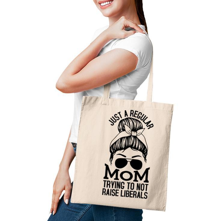 Just A Regular Mom Trying To Not Raise Liberals Black Graphic Tote Bag
