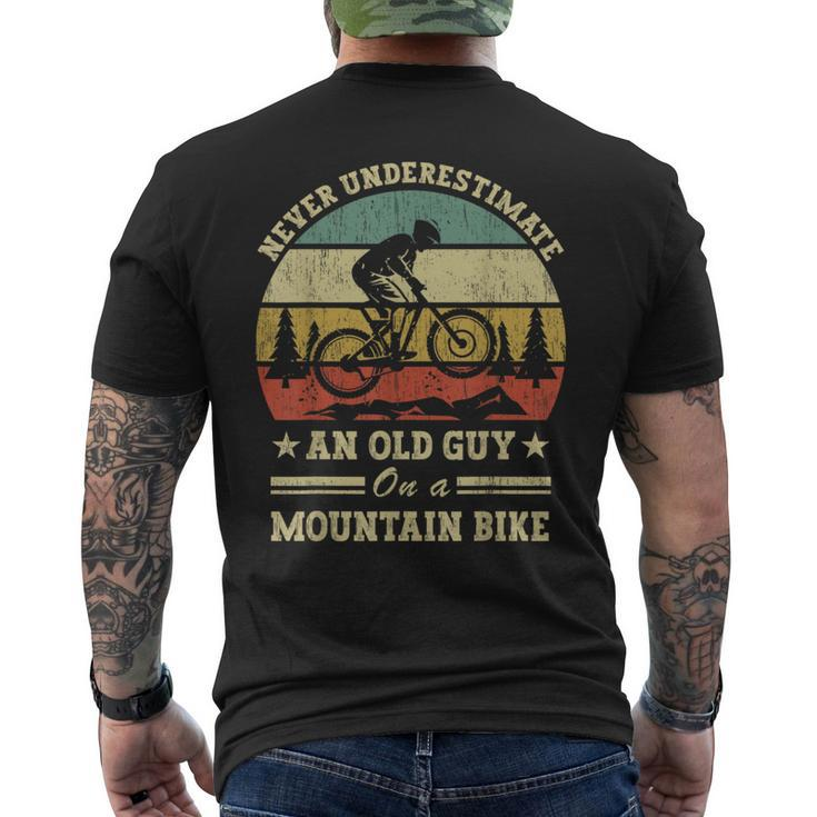 Never Underestimate An Old Guy On A Mountain Bike Men's T-shirt Back Print