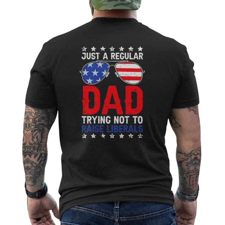 Just A Regular Dad Trying Not To Raise Liberals Voted Trump Mens Back Print T-shirt