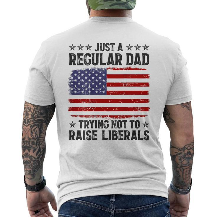 Just A Regular Dad Trying Not To Raise Liberals On Back Mens Men's T-shirt Back Print