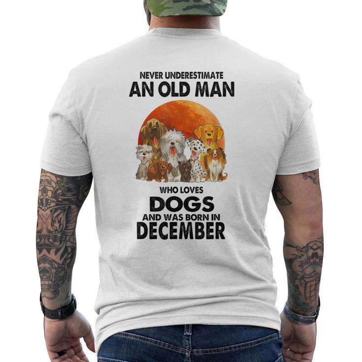 Never Underestimate An Old Man Who Loves Dogs Born December Men's T-shirt Back Print