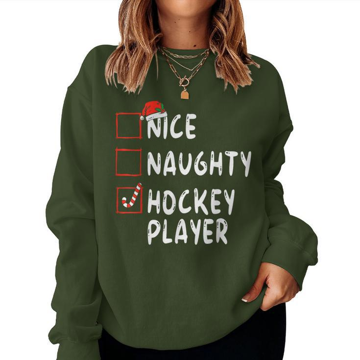 Nice Naughty Hockey Player Christmas Santa Hat Boys Girls Women Sweatshirt