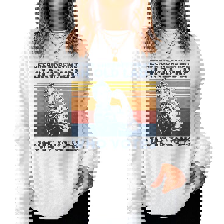 Never Underestimate An Old Lady Who Votes Feminist Women Sweatshirt