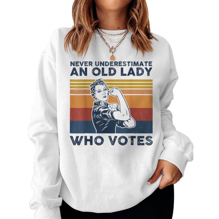 Never Underestimate An Old Lady Who Votes Feminist Women Sweatshirt