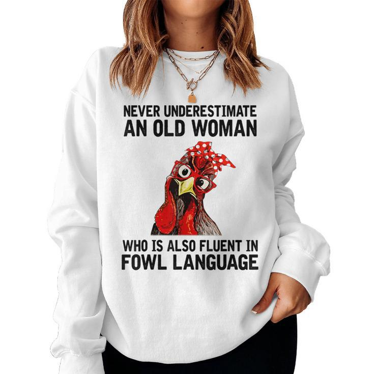 Never Underestimate An Old Woman Who Is Also Fluent Chickens Women Sweatshirt