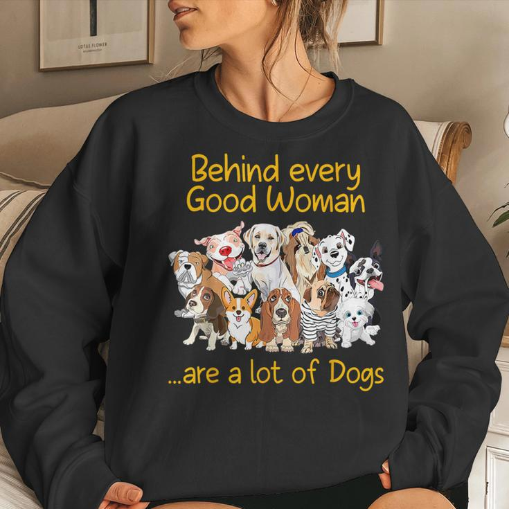 Behind Every Good Woman Are A Lot Of Dogs Dog Lovers Women Sweatshirt Gifts for Her