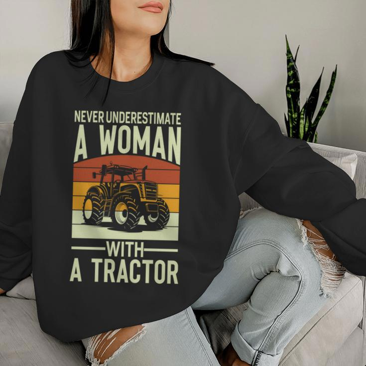Never Underestimate A Woman With A Tractor Farmer Women Sweatshirt Gifts for Her