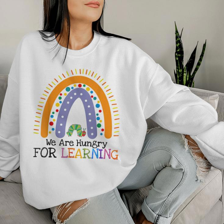 We Are Hungry For Learning Rainbow Caterpillar Teacher Women Sweatshirt Gifts for Her