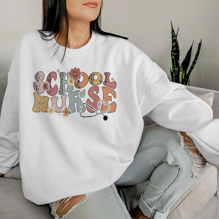 Retro Groovy Floral School Nurse Appreciation Back To School Women Sweatshirt Gifts for Her