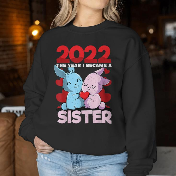 Becoming A Sister 2022 Bunny Baby Sibling Announcement Women Sweatshirt Unique Gifts