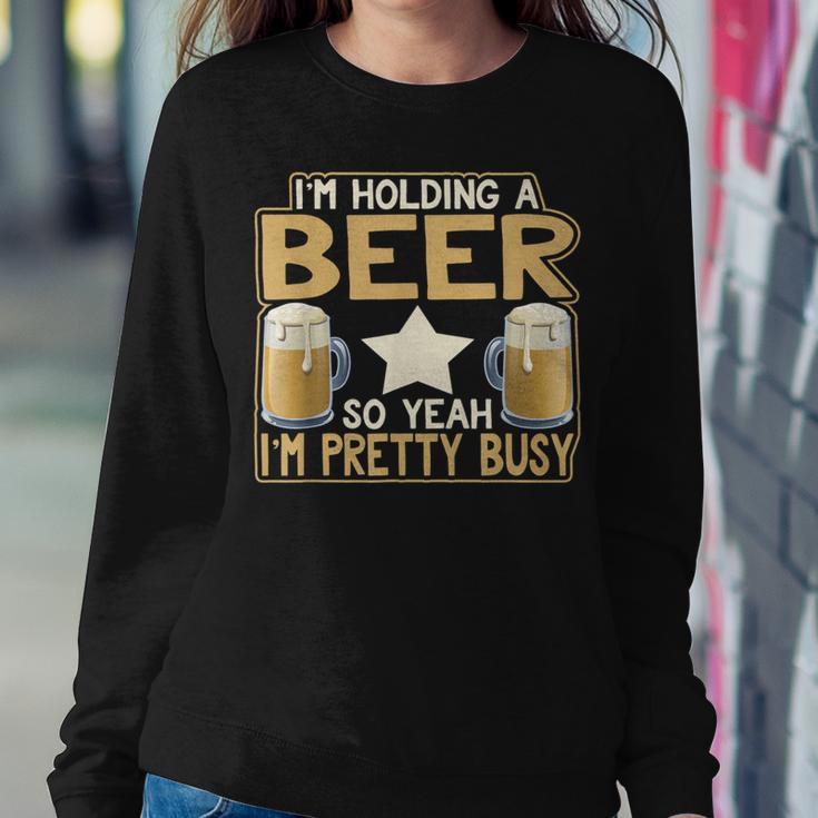 I'm Holding A Beer So Yeah I'm Pretty Busy Beer Lover Women Sweatshirt Unique Gifts