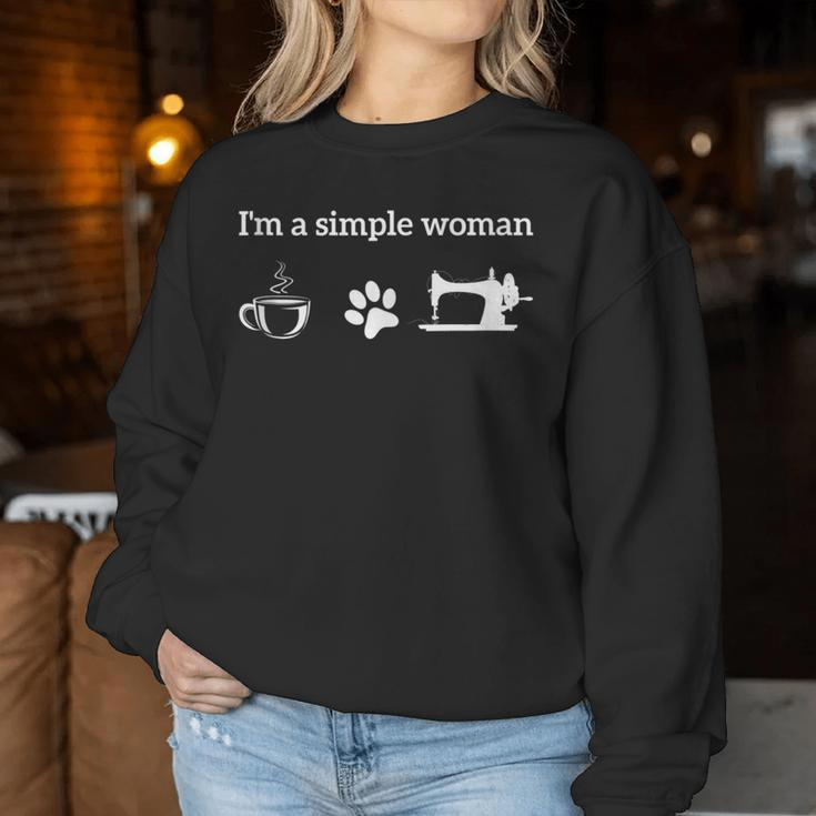 I'm A Simple Woman Loves Coffee Dog And Sewing Quilting Women Sweatshirt Unique Gifts