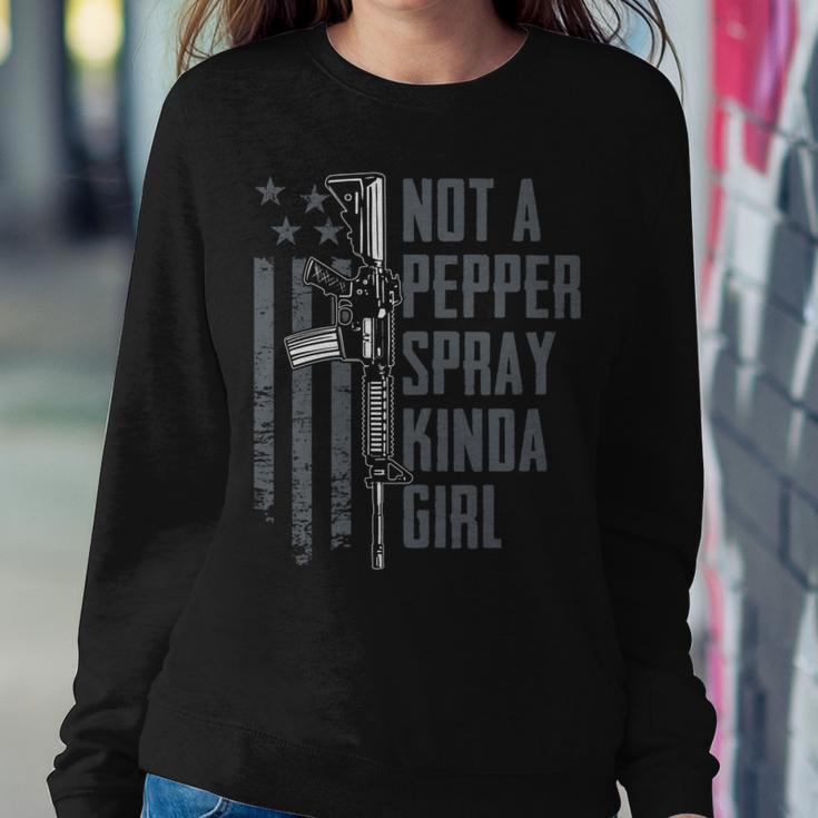 Not A Pepper Spray Kinda Girl Gun Owner On Back Women Sweatshirt Unique Gifts