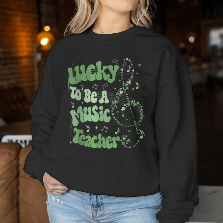 Retro Groovy Lucky To Be A Music Teacher St Patrick's Day Women Sweatshirt Personalized Gifts