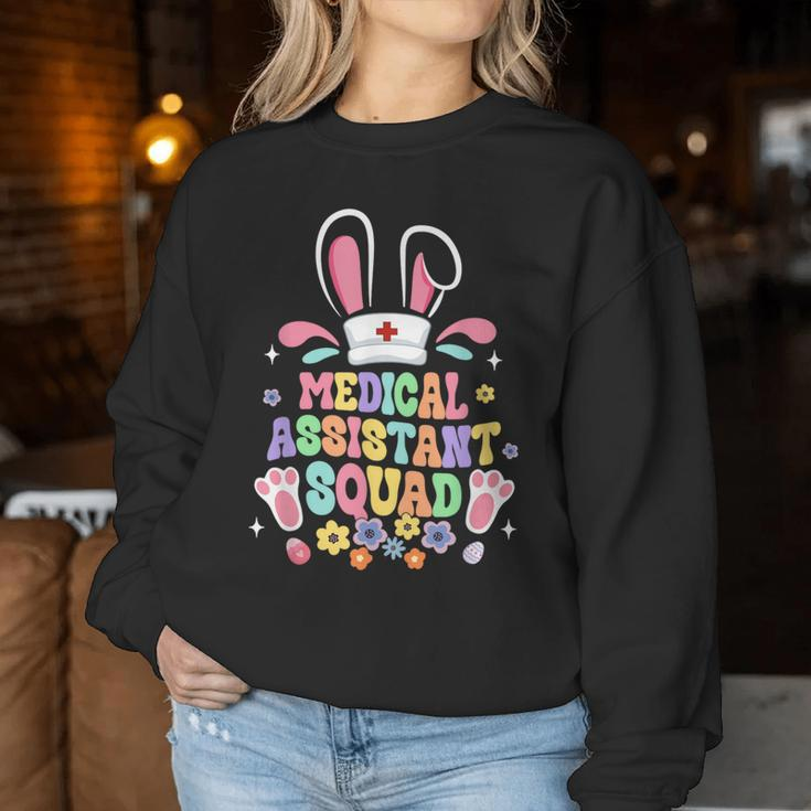 Retro Groovy Medical Assistant Squad Bunny Ear Flower Easter Women Sweatshirt Unique Gifts