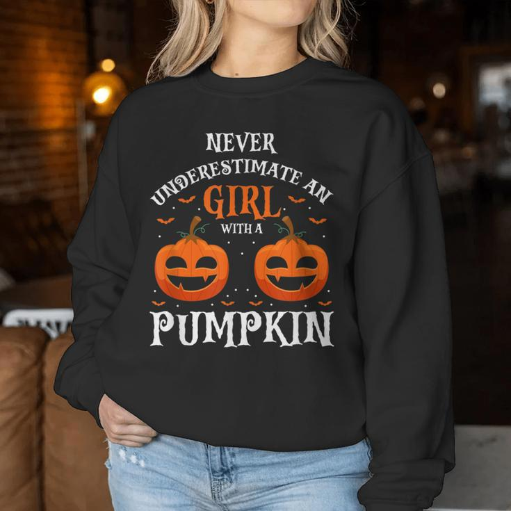 Never Underestimate A Girl With A Pumpkin Present Women Sweatshirt Personalized Gifts