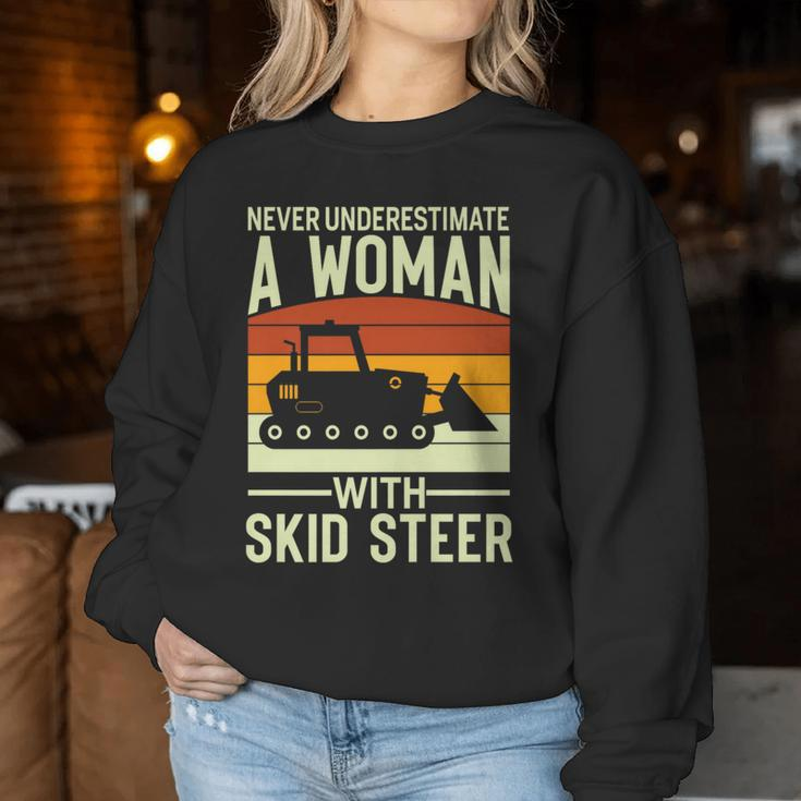 Never Underestimate A Woman With A Skid Sr Construction Women Sweatshirt Personalized Gifts