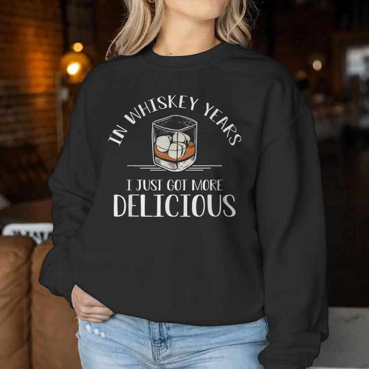In Whiskey Years I Just Got More Delicious Whiskey Women Sweatshirt Personalized Gifts
