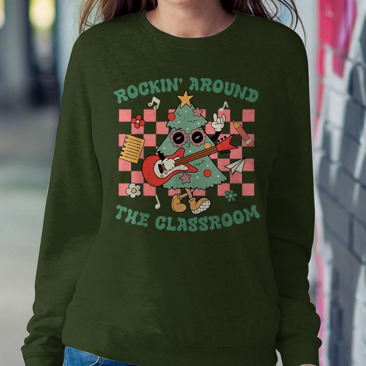 Retro Groovy Teacher Christmas Rockin' Around The Classroom Women Sweatshirt Funny Gifts
