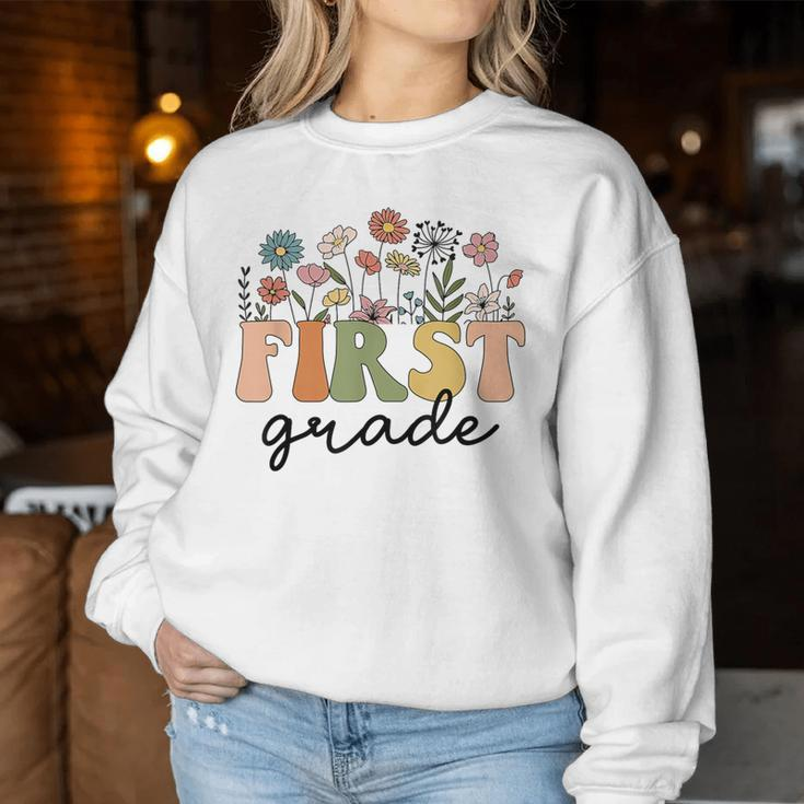 First Grade Teacher Wildflower Back To School Floral Outfits Women Sweatshirt Funny Gifts