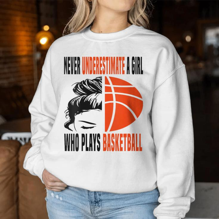 Never Underestimate A Girl Who Plays Basketball Messy Bun Women Sweatshirt Unique Gifts